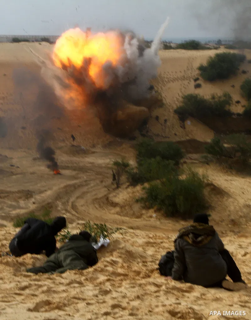 Palestinian Islamic Jihad militants participate in a training session in the outskirts of Khan Younis, southern Gaza Strip, Thursday, Feb. 10, 2011. Islamic Jihad carried out dozens of suicide bombings and other attacks...
