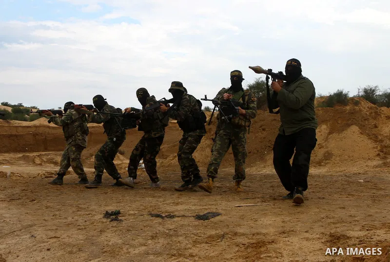 Palestinian Islamic Jihad militants participate in a training session in the outskirts of Khan Younis, southern Gaza Strip, Thursday, Feb. 10, 2011. Islamic Jihad carried out dozens of suicide bombings and other attacks...