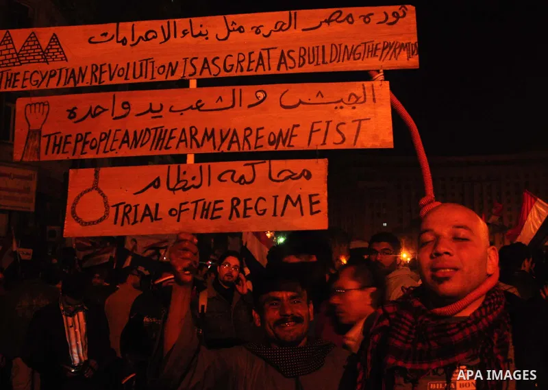 Anti-government protesters react as Egyptian President Hosni Mubarak makes a televised statement to his nation in Tahrir Square in downtown Cairo, Egypt Thursday, Feb. 10, 2011. Photo by Ahmed Asad