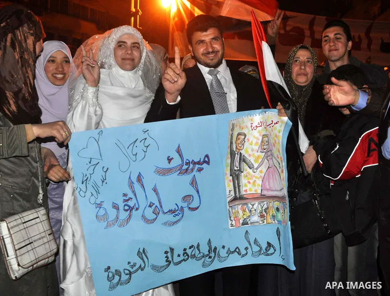 Anti-government protesters react as Egyptian President Hosni Mubarak makes a televised statement to his nation in Tahrir Square in downtown Cairo, Egypt Thursday, Feb. 10, 2011. Photo by Ahmed Asad
