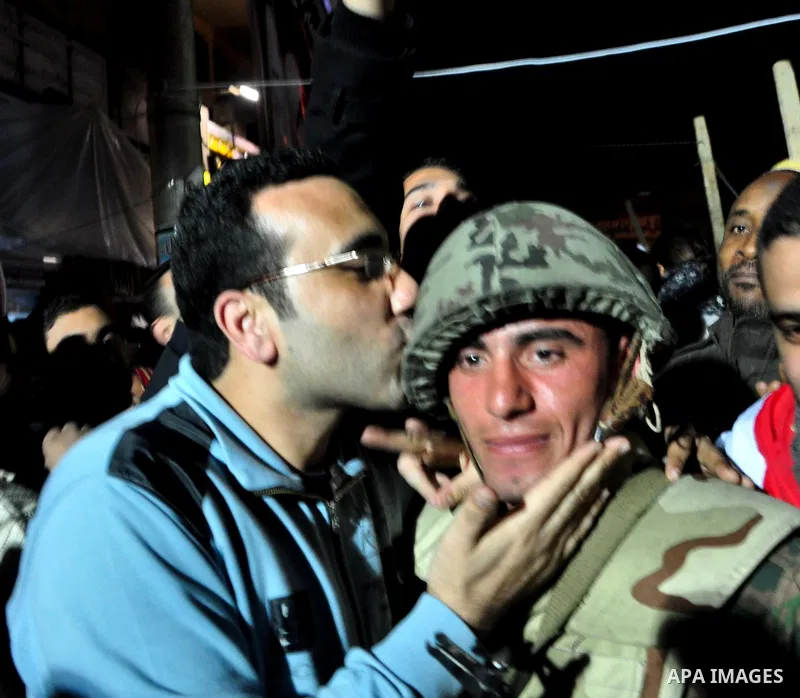 Anti-government protesters react as Egyptian President Hosni Mubarak makes a televised statement to his nation in Tahrir Square in downtown Cairo, Egypt Thursday, Feb. 10, 2011. Photo by Ahmed Asad
