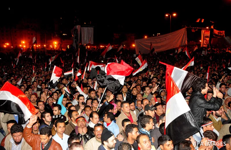 Anti-government protesters react as Egyptian President Hosni Mubarak makes a televised statement to his nation in Tahrir Square in downtown Cairo, Egypt Thursday, Feb. 10, 2011. Photo by Ahmed Asad