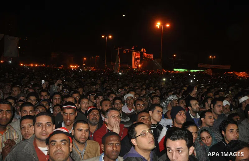 Anti-government protesters react as Egyptian President Hosni Mubarak makes a televised statement to his nation in Tahrir Square in downtown Cairo, Egypt Thursday, Feb. 10, 2011. Photo by Ahmed Asad