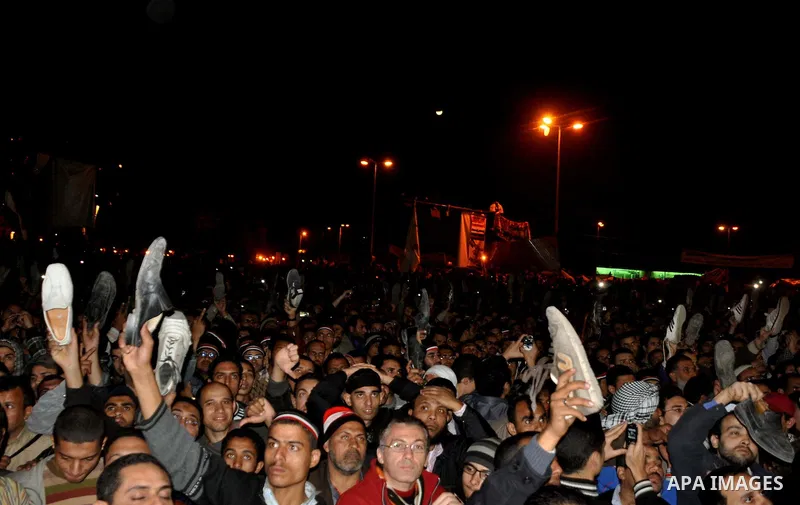 nti-government protesters hold their shoes as they react with to Egyptian President Hosni Mubarak's televised statement to his nation in Tahrir Square in downtown Cairo, Egypt Thursday, Feb. 10, 2011. Egyptian President...