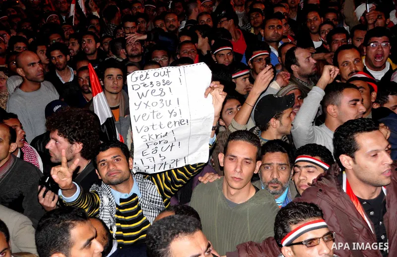 Anti-government protesters react as Egyptian President Hosni Mubarak makes a televised statement to his nation in Tahrir Square in downtown Cairo, Egypt Thursday, Feb. 10, 2011. Photo by Ahmed Asad