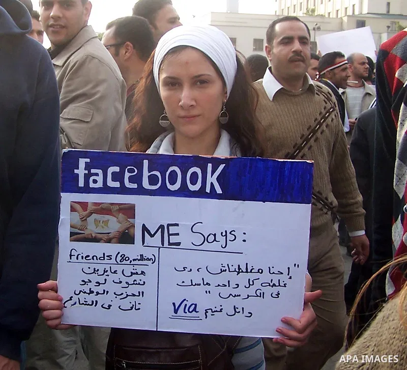 Anti-government protesters gather in front the state television building in Cairo, Egypt, Friday, Feb. 11, 2011. Mubarak has refused to step down or leave the country, and instead handed his administrative powers to his...