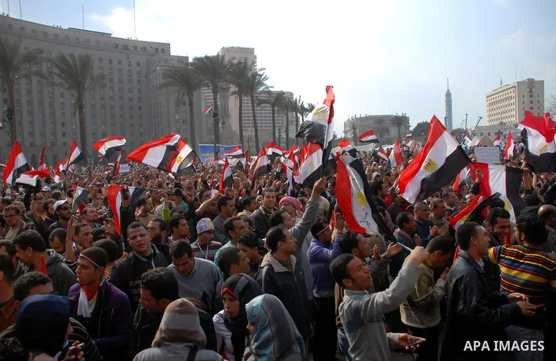 Anti-government protesters demonstrate after traditional Muslim Friday prayers at the continuing demonstration in Tahrir Square in downtown Cairo, Egypt, Friday, Feb. 11, 2011. Photo by Ahmed Asad