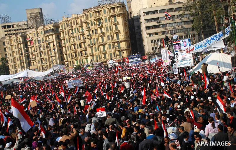 Anti-government protesters demonstrate after traditional Muslim Friday prayers at the continuing demonstration in Tahrir Square in downtown Cairo, Egypt, Friday, Feb. 11, 2011. Photo by Ahmed Asad