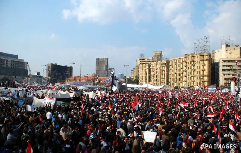 Anti-government protesters demonstrate after traditional Muslim Friday prayers at the continuing demonstration in Tahrir Square in downtown Cairo, Egypt, Friday, Feb. 11, 2011. Photo by Ahmed Asad