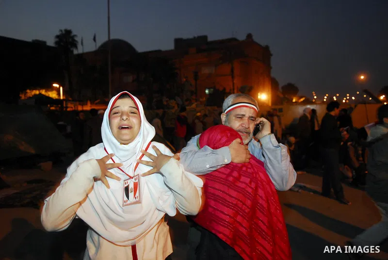 Egyptians celebrate the news of the resignation of President Hosni Mubarak, who handed control of the country to the military, at night in Tahrir Square in downtown Cairo, Egypt Friday, Feb. 11, 2011. Photo by Ahmed Asad