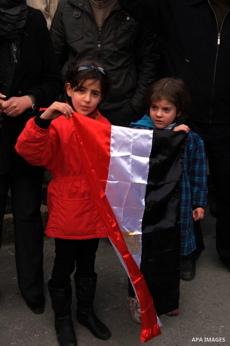 Palestinians celebrate Egyptian President Hosni Mubarak's resignation, in the West Bank city of Nablus, Saturday, Feb. 12 , 2011. Photo by Wagdi Eshtayah