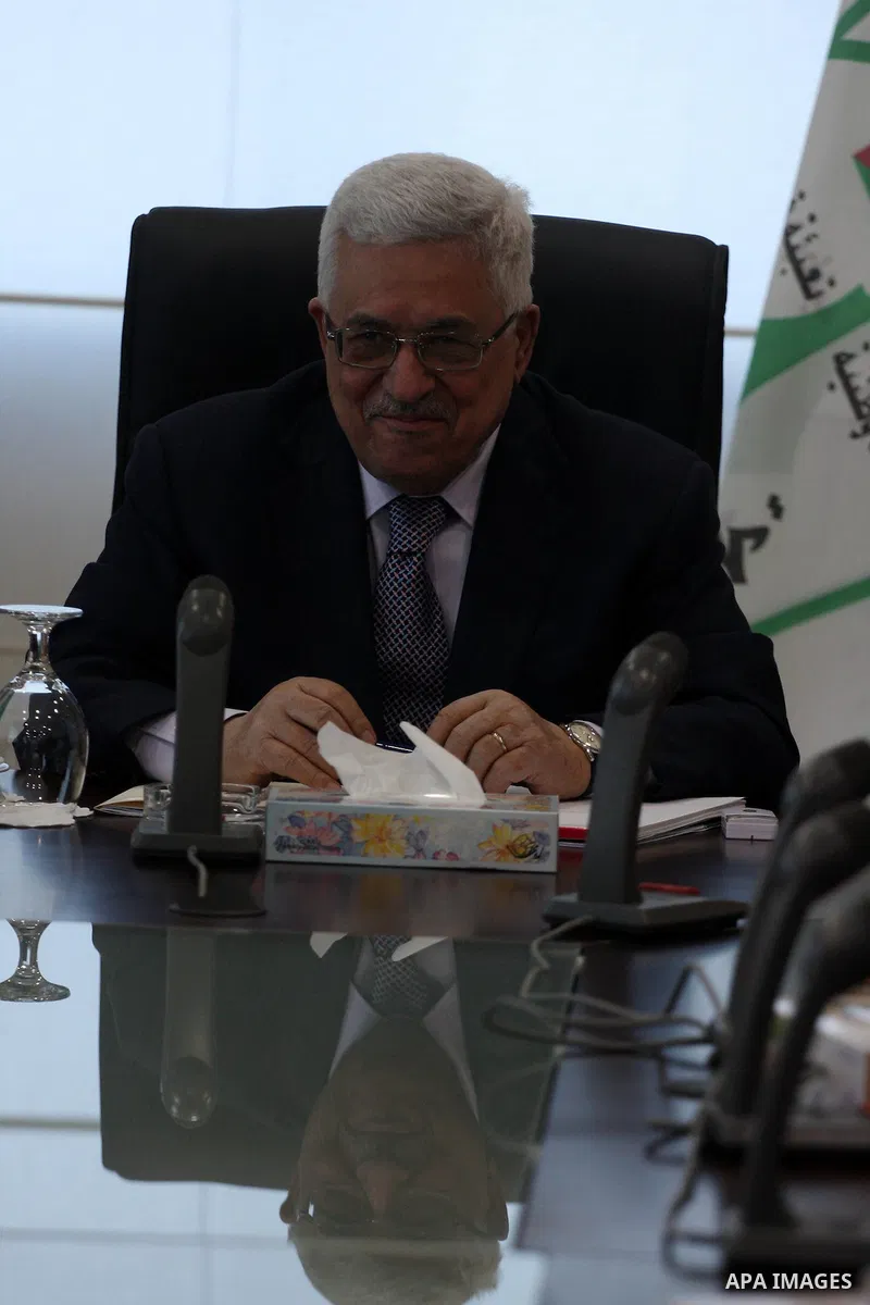 Palestinian President Mahmoud Abbas attends a Palestinian Liberation Organization (PLO) executive committee meeting in the West Bank city of Ramallah, Saturday, Feb. 12, 2011. Photo by Issam Rimawi