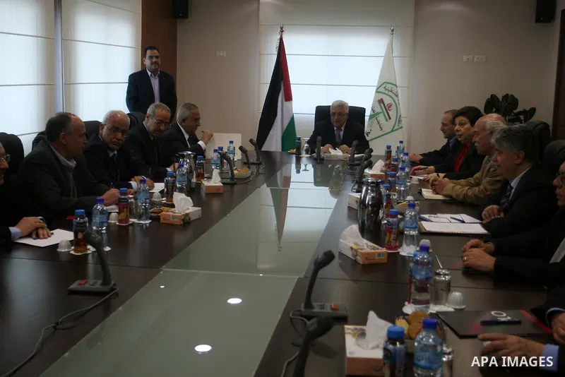 Palestinian President Mahmoud Abbas attends a Palestinian Liberation Organization (PLO) executive committee meeting in the West Bank city of Ramallah, Saturday, Feb. 12, 2011. Photo by Issam Rimawi