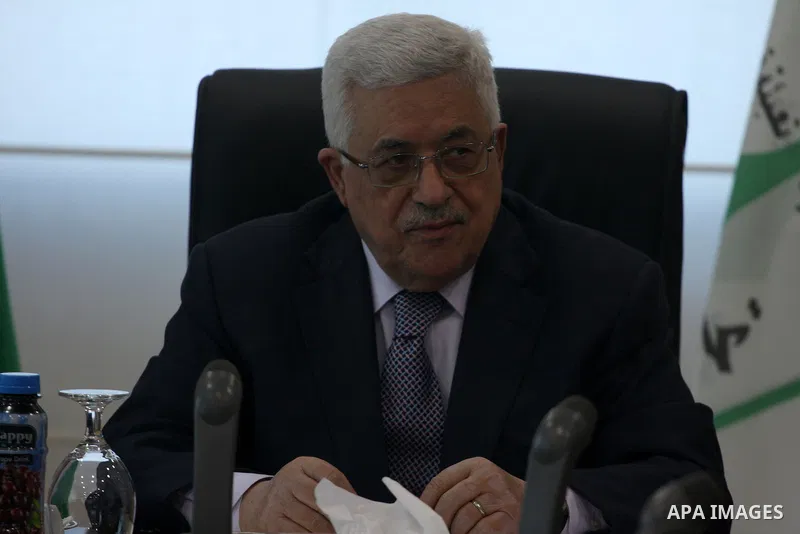 Palestinian President Mahmoud Abbas attends a Palestinian Liberation Organization (PLO) executive committee meeting in the West Bank city of Ramallah, Saturday, Feb. 12, 2011. Photo by Issam Rimawi