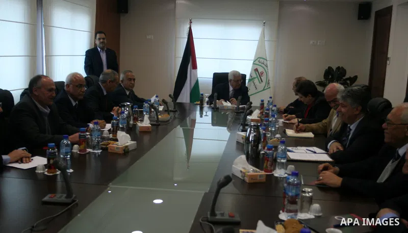 Palestinian President Mahmoud Abbas attends a Palestinian Liberation Organization (PLO) executive committee meeting in the West Bank city of Ramallah, Saturday, Feb. 12, 2011. Photo by Issam Rimawi