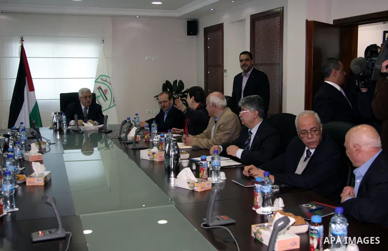Palestinian President Mahmoud Abbas attends a Palestinian Liberation Organization (PLO) executive committee meeting in the West Bank city of Ramallah, Saturday, Feb. 12, 2011. Photo by Thaer Ganaim