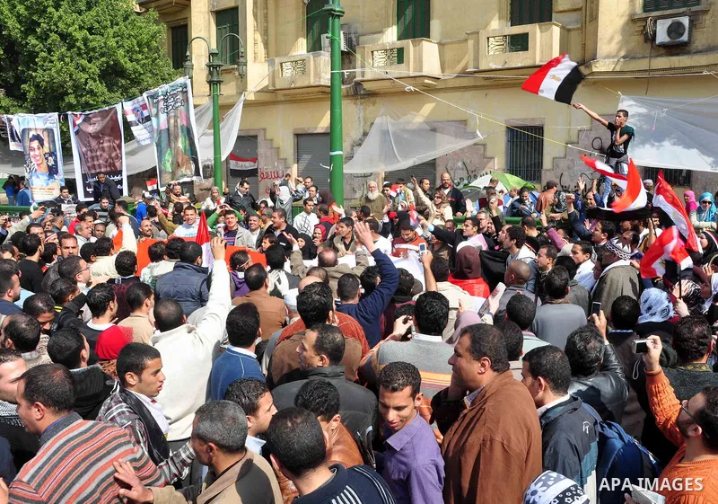 Egyptians celebrate and wave national flags in Tahrir Square in Cairo, Egypt, Saturday, Feb. 12, 2011. Egypt exploded with joy, tears, and relief after pro-democracy protesters brought down President Hosni Mubarak with a...