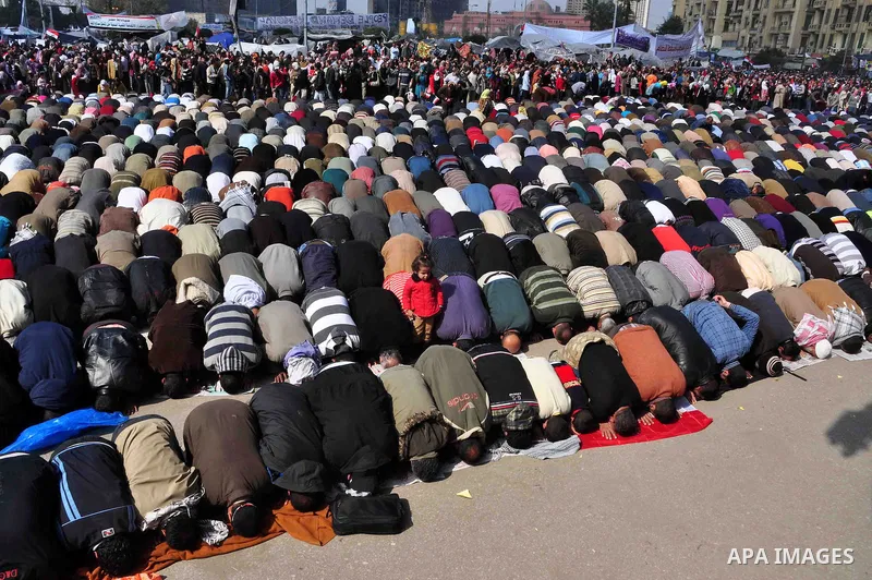 Egyptians pray in Tahrir Square in Cairo, Egypt, Saturday, Feb. 12, 2011. Egypt exploded with joy, tears, and relief after pro-democracy protesters brought down President Hosni Mubarak with a momentous march on his palac...