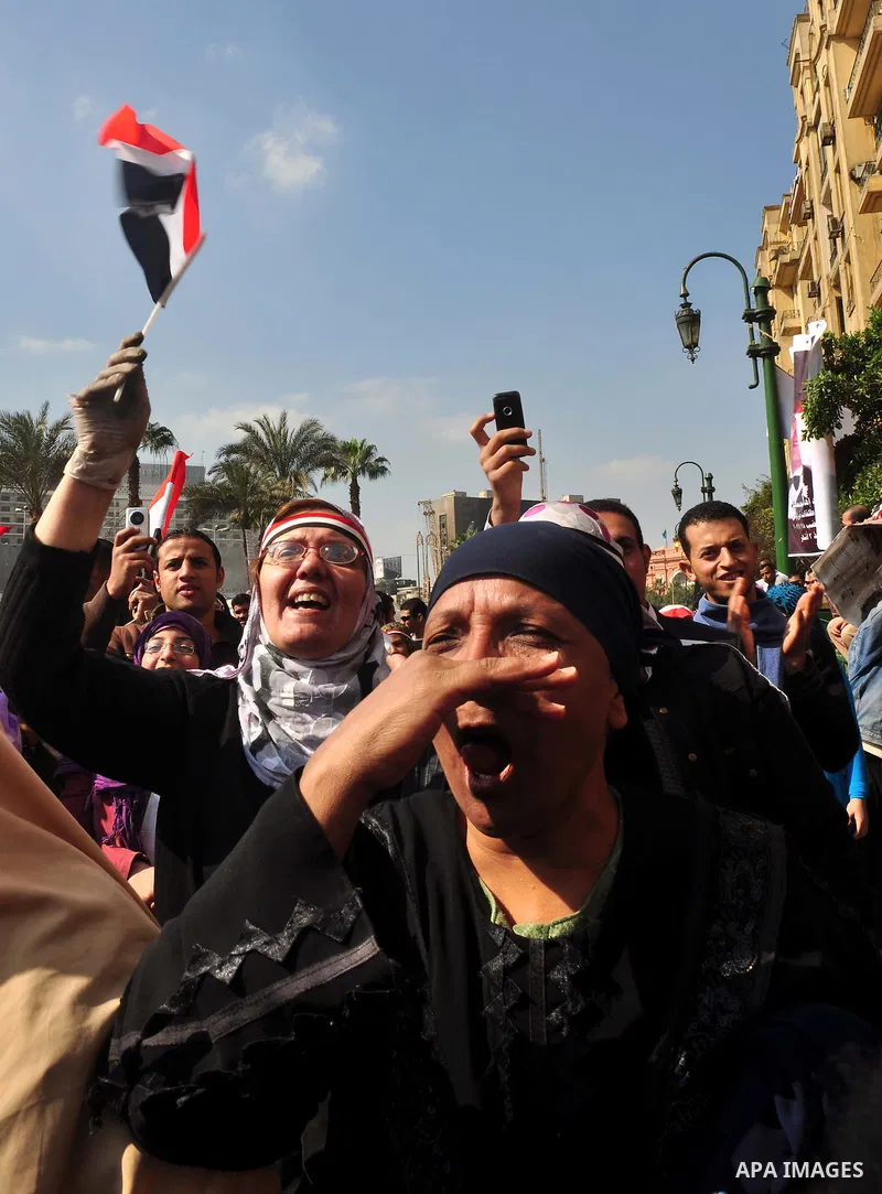Egyptians celebrate and wave national flags in Tahrir Square in Cairo, Egypt, Saturday, Feb. 12, 2011. Egypt exploded with joy, tears, and relief after pro-democracy protesters brought down President Hosni Mubarak with a...
