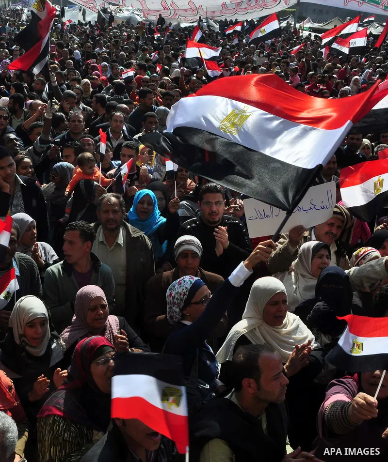 Egyptians celebrate and wave national flags in Tahrir Square in Cairo, Egypt, Saturday, Feb. 12, 2011. Egypt exploded with joy, tears, and relief after pro-democracy protesters brought down President Hosni Mubarak with a...
