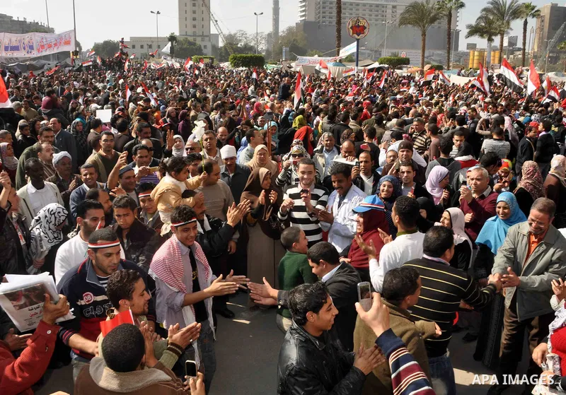 Egyptians celebrate and wave national flags in Tahrir Square in Cairo, Egypt, Saturday, Feb. 12, 2011. Egypt exploded with joy, tears, and relief after pro-democracy protesters brought down President Hosni Mubarak with a...