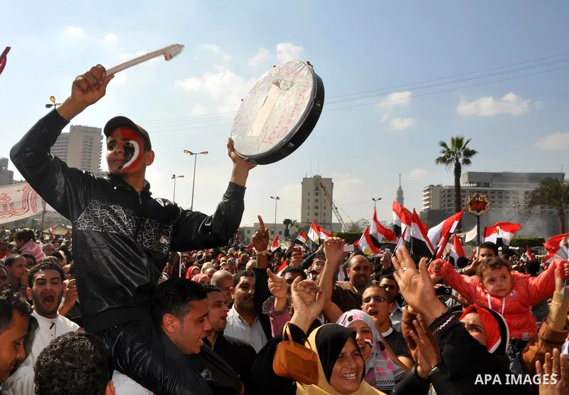 Egyptians celebrate and wave national flags in Tahrir Square in Cairo, Egypt, Saturday, Feb. 12, 2011. Egypt exploded with joy, tears, and relief after pro-democracy protesters brought down President Hosni Mubarak with a...