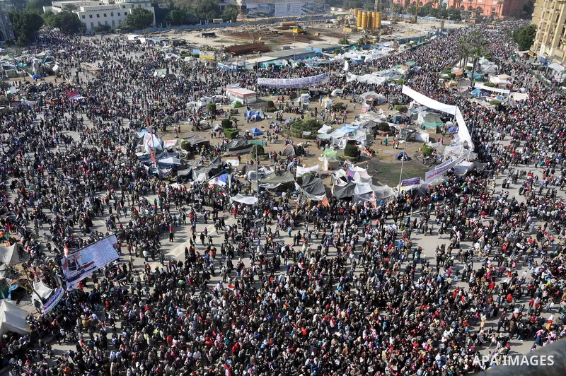 Egyptians celebrate and wave national flags in Tahrir Square in Cairo, Egypt, Saturday, Feb. 12, 2011. Egypt exploded with joy, tears, and relief after pro-democracy protesters brought down President Hosni Mubarak with a...