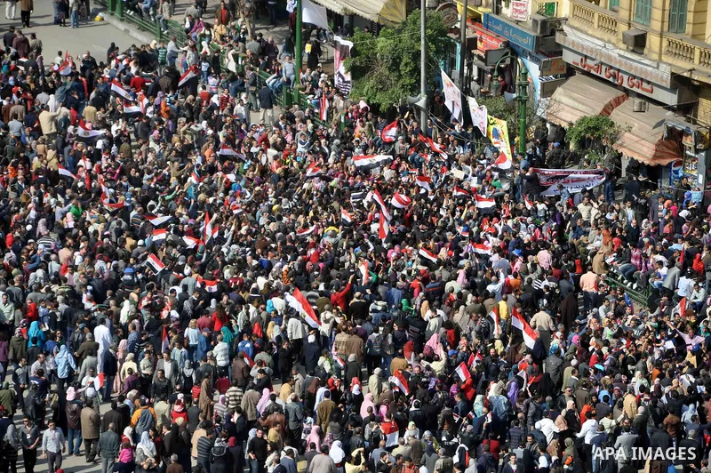 Egyptians celebrate and wave national flags in Tahrir Square in Cairo, Egypt, Saturday, Feb. 12, 2011. Egypt exploded with joy, tears, and relief after pro-democracy protesters brought down President Hosni Mubarak with a...