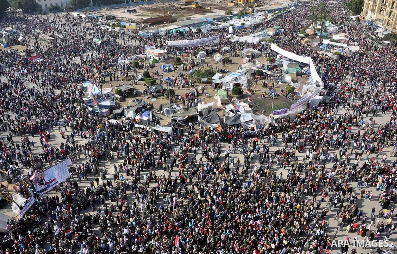 Egyptians celebrate and wave national flags in Tahrir Square in Cairo, Egypt, Saturday, Feb. 12, 2011. Egypt exploded with joy, tears, and relief after pro-democracy protesters brought down President Hosni Mubarak with a...
