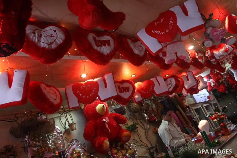 A Palestinian vendor prepares gifts for Valentine's Day at a shop in Gaza City on February 13, 2010. Valentine's Day marks a Christian holiday on Feb, 14. Photo by Mohammed Asad