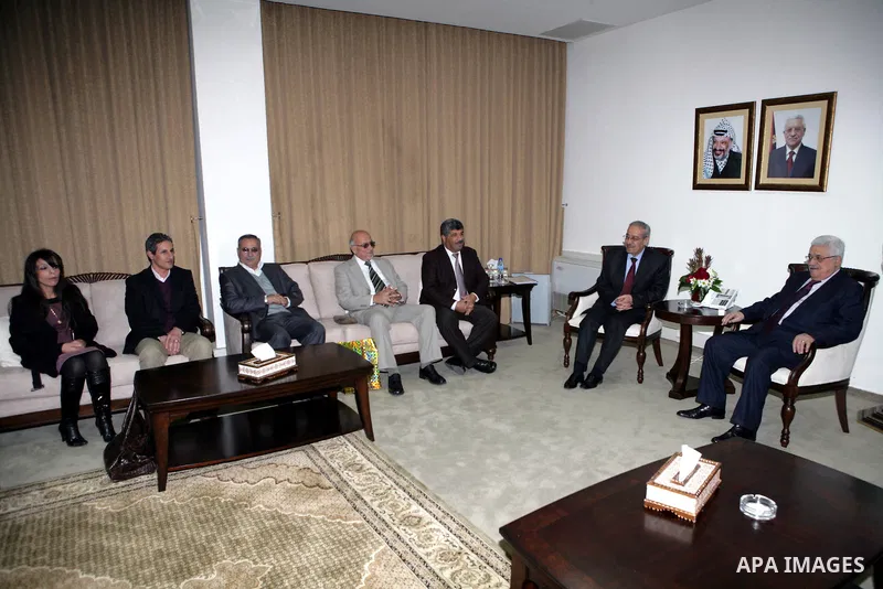 Palestinian President Mahmoud Abbas during a meeting with the National Committee for the register of the Wall damage in the West Bank city of Ramallah, Sunday, Feb. 13, 2011. Photo by Thaer Ganaim