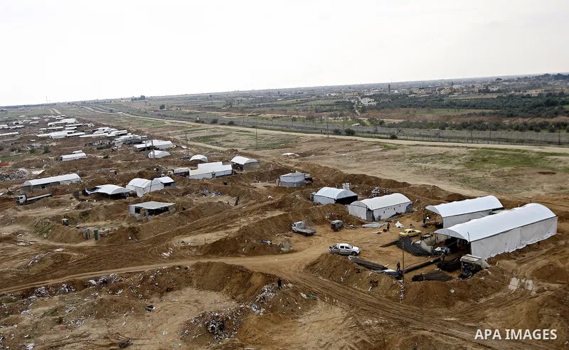 Tents cover entrances of tunnels used for smuggling along the Gaza-Egypt border, near the southern Gaza Strip town of Rafah, on February 13, 2011. Tunnels under the town of Rafah that straddles the Egypt-Gaza frontier ar...