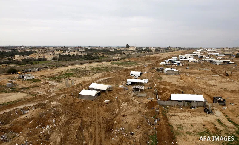 Tents cover entrances of tunnels used for smuggling along the Gaza-Egypt border, near the southern Gaza Strip town of Rafah, on February 13, 2011. Tunnels under the town of Rafah that straddles the Egypt-Gaza frontier ar...