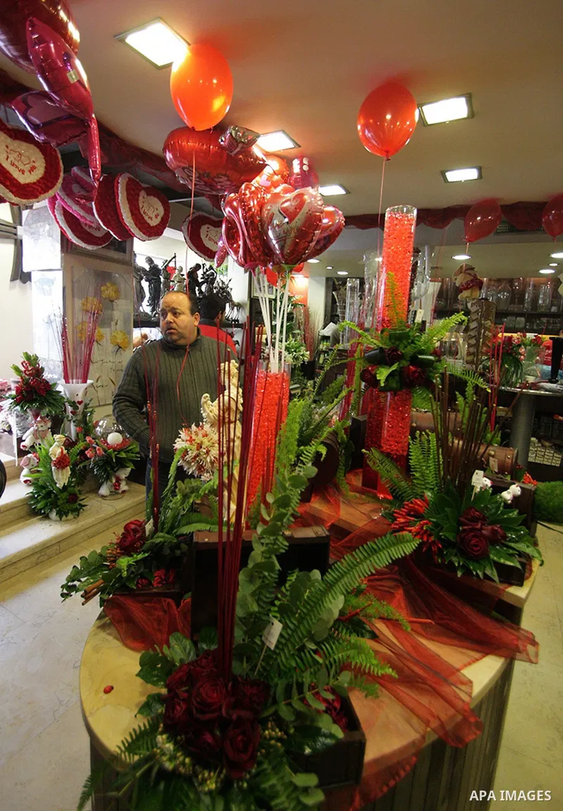 A Palestinian vendor prepares gifts for Valentine's Day at his shop in the biblical town of Bethlehem, on February 13, 2011. Valentine's Day marks a Christian holiday on Feb, 14.. Photo by Najeh Hashlamoun