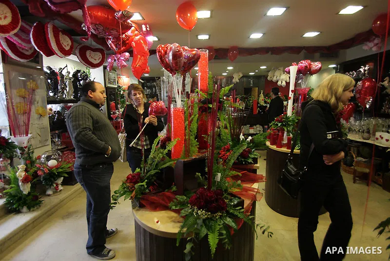 A Palestinian vendor prepares gifts for Valentine's Day at his shop in the biblical town of Bethlehem, on February 13, 2011. Valentine's Day marks a Christian holiday on Feb, 14.. Photo by Najeh Hashlamoun