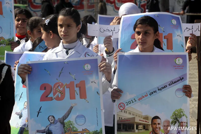 Palestinian students participate in a rally during a campaign against smoking, in Gaza City on Feb. 14, 2011. Photo by Mohammed Asad