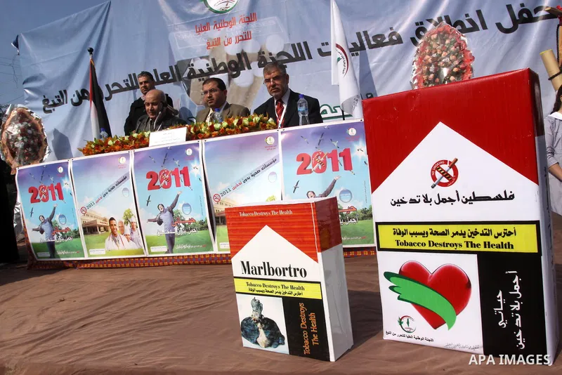 Palestinians participate in a rally during a campaign against smoking, in Gaza City on Feb. 14, 2011. Photo by Mohammed Asad