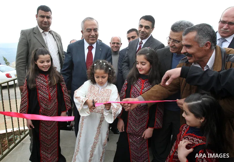 Palestinian Prime Minister Salam Fayyad during the inauguration of several projects in Deir Ghassaneh in the West Bank city of Ramallah on Feb. 14,2011. Photo by Mustafa Abu Dayeh