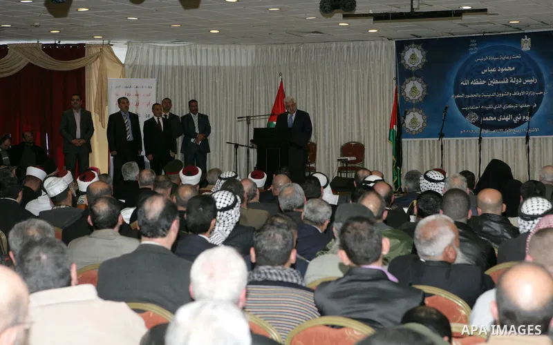 Palestinian President Mahmoud Abbas participates in the ceremony of "birth of the Prophet Muhammad" in the West Bank city of Ramallah February 14, 2011. Photo by Thaer Ganaim