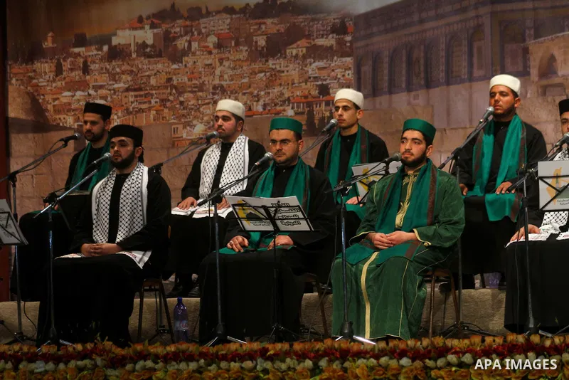 Palestinian youths sing Islamic songs during a ceremony commemorating the birth of Prophet Muhammad, known in Arabic as Mawlid al-Nabawi, at the Shawwa Theatre in Gaza City on Feb. 15, 2011. Photo by Ashraf Amra
