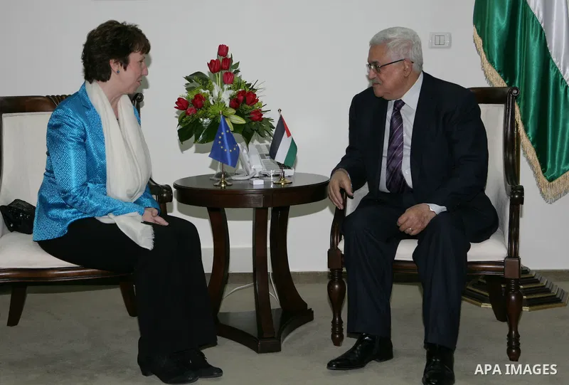 Palestinian President Mahmoud Abbas (R) meets with Catherine Ashton (L), high representative for foreign affairs and security policy of the European Union, in the West Bank city of Ramallah, on Feb. 15, 2011. Photo by Th...