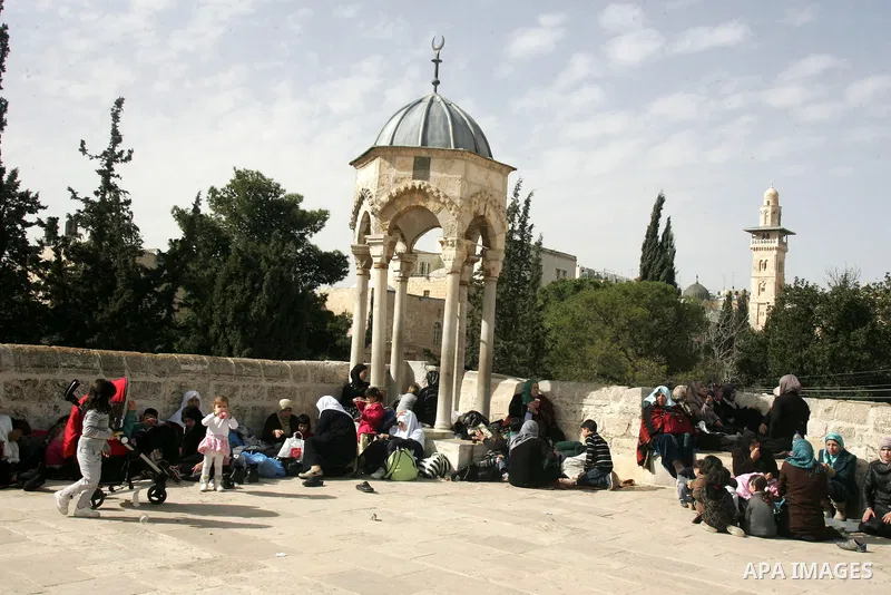Palestinian Muslims celebrate the anniversary of the prophet Mohammed birth at the Al-Aqsa Mosque compound in Jerusalem on Feb. 15,2011. Photo by Mahfouz Abu Turk