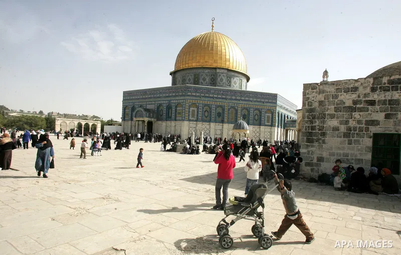 Palestinian Muslims celebrate the anniversary of the prophet Mohammed birth at the Al-Aqsa Mosque compound in Jerusalem on Feb. 15,2011. Photo by Mahfouz Abu Turk