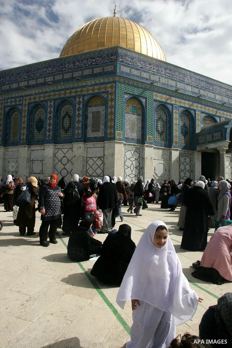 Palestinian Muslims celebrate the anniversary of the prophet Mohammed birth at the Al-Aqsa Mosque compound in Jerusalem on Feb. 15,2011. Photo by Mahfouz Abu Turk