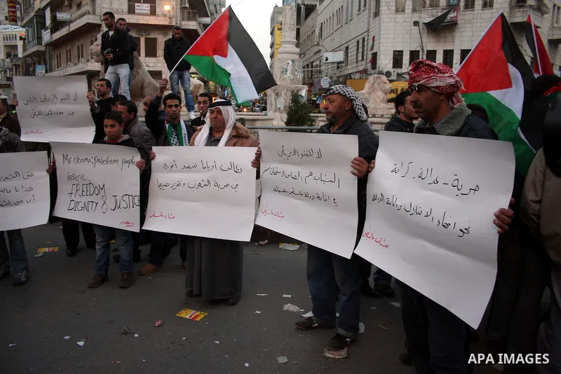 Palestinians protest in the center of the West Bank city of Ramallah on February 15, 2011, after six influential elected officials of both parties in the U.S. House of Representatives wrote last month to US President Bar...