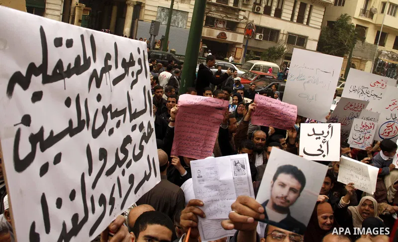 Egyptians take part in a rally calling for release of political prisoners in Cairo, Egypt, Wednesday, Feb. 16, 2011. Photo by Ahmed Asad