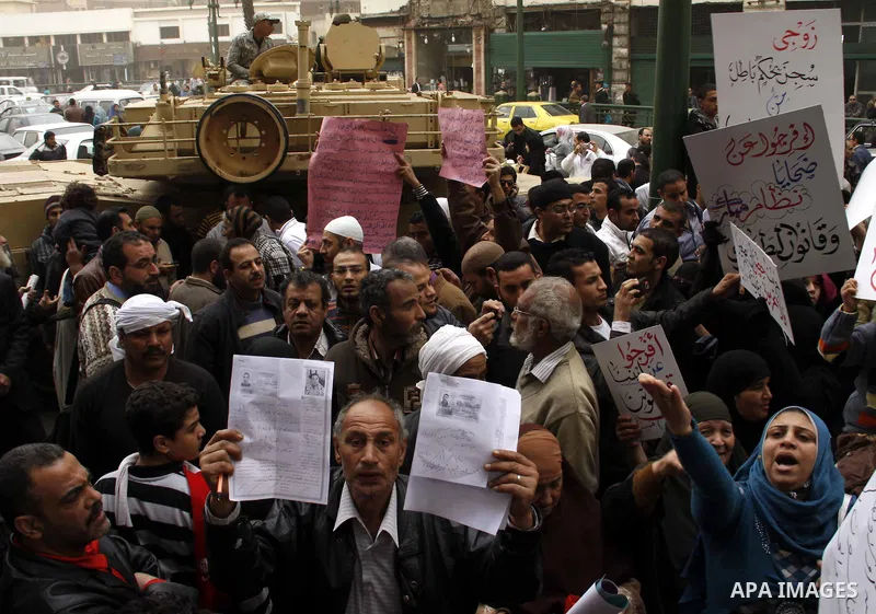 Egyptians take part in a rally calling for release of political prisoners in Cairo, Egypt, Wednesday, Feb. 16, 2011. Photo by Ahmed Asad