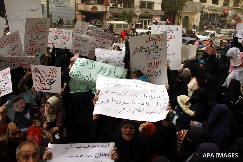 Egyptians take part in a rally calling for release of political prisoners in Cairo, Egypt, Wednesday, Feb. 16, 2011. Photo by Ahmed Asad