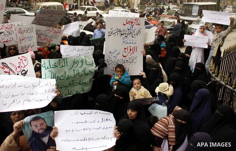 Egyptians take part in a rally calling for release of political prisoners in Cairo, Egypt, Wednesday, Feb. 16, 2011. Photo by Ahmed Asad