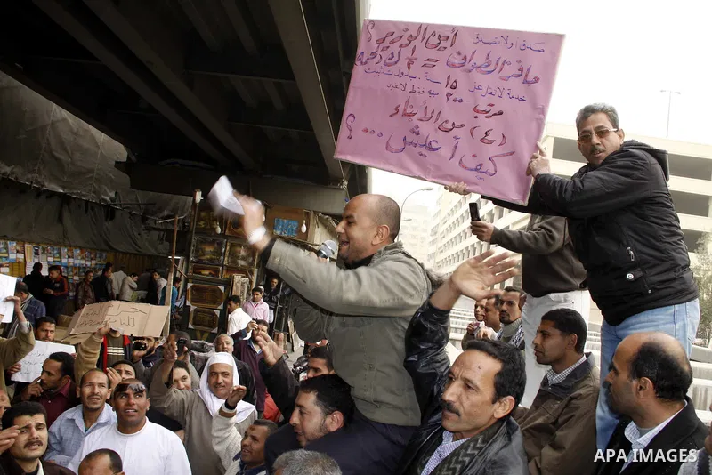 Egyptian protesters take part in a rally in front of the postal authority in Cairo, Egypt, Wedneday, Feb. 16, 2011. Photo by Ahmed Asad